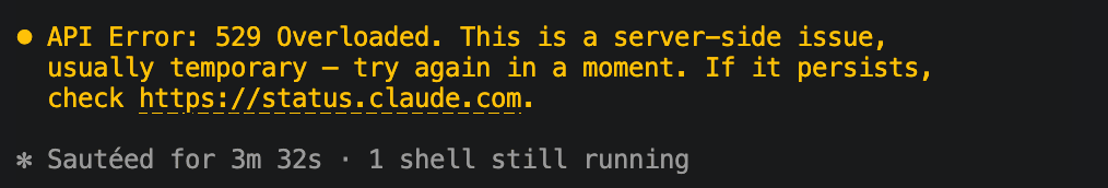 The actual error: Claude Code reporting API Error 529 Overloaded mid-session, helpfully suggesting I check the status page